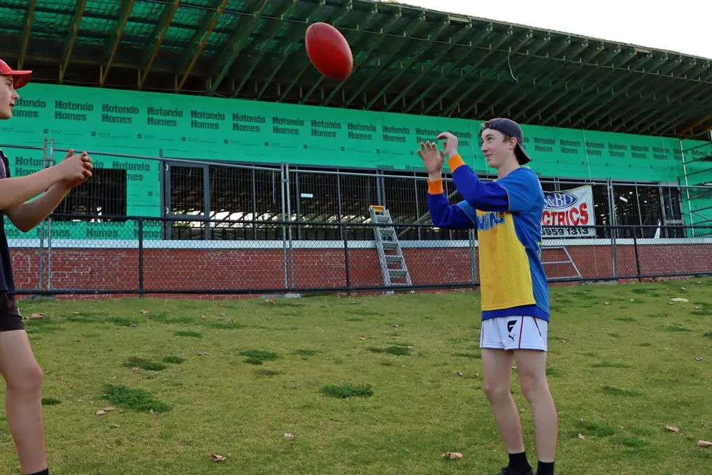 Eagles Under-15 players David Beard, 14, and Ky Bloomfield, 15, will be among those to benefit in the future from the new facilities underway at Narrandera sportsground. Photo: Kim Woods