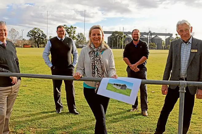 Member for Farrer Sussan Ley makes the funding announcement with Council staff George Cowan, Roger Evans, Shane Wilson and Mayor Neville Kschenka. Photo: Kim Woods.