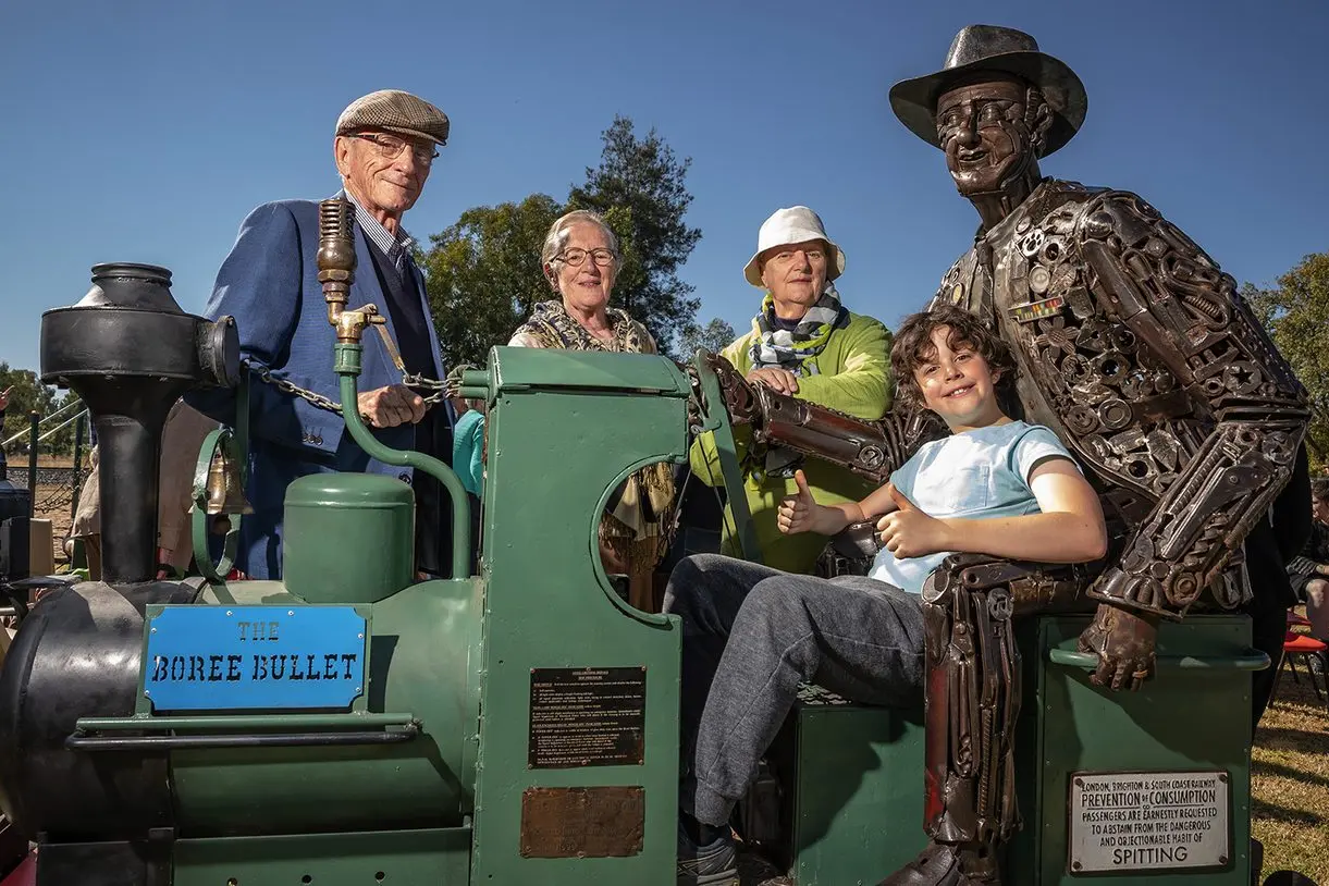 Tim Fischer\\u2019s siblings Dr Tony Fischer, Vicki Baudry and Carol Coghill at the sculpture with his great nephew Finn Baudry. Photo: Simon Dallinger
