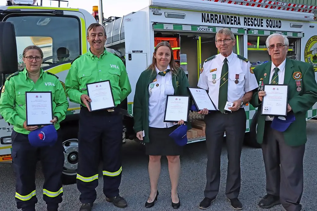 Receiving their citations from the Minister for Police and Emergency Services David Elliott were volunteers Tammy Riddell and Wayne Heidtmann, Narrandera, Tarryn and Robert Slot, Corowa, and Jim Wallace (standing in for Craig Munro). Photo: Kim Woods