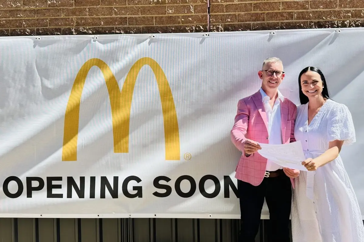 Brad and Kate Carroll outside the site of the new McDonald\\u2019s in Phillip. Photo: Brad Carroll.\\n