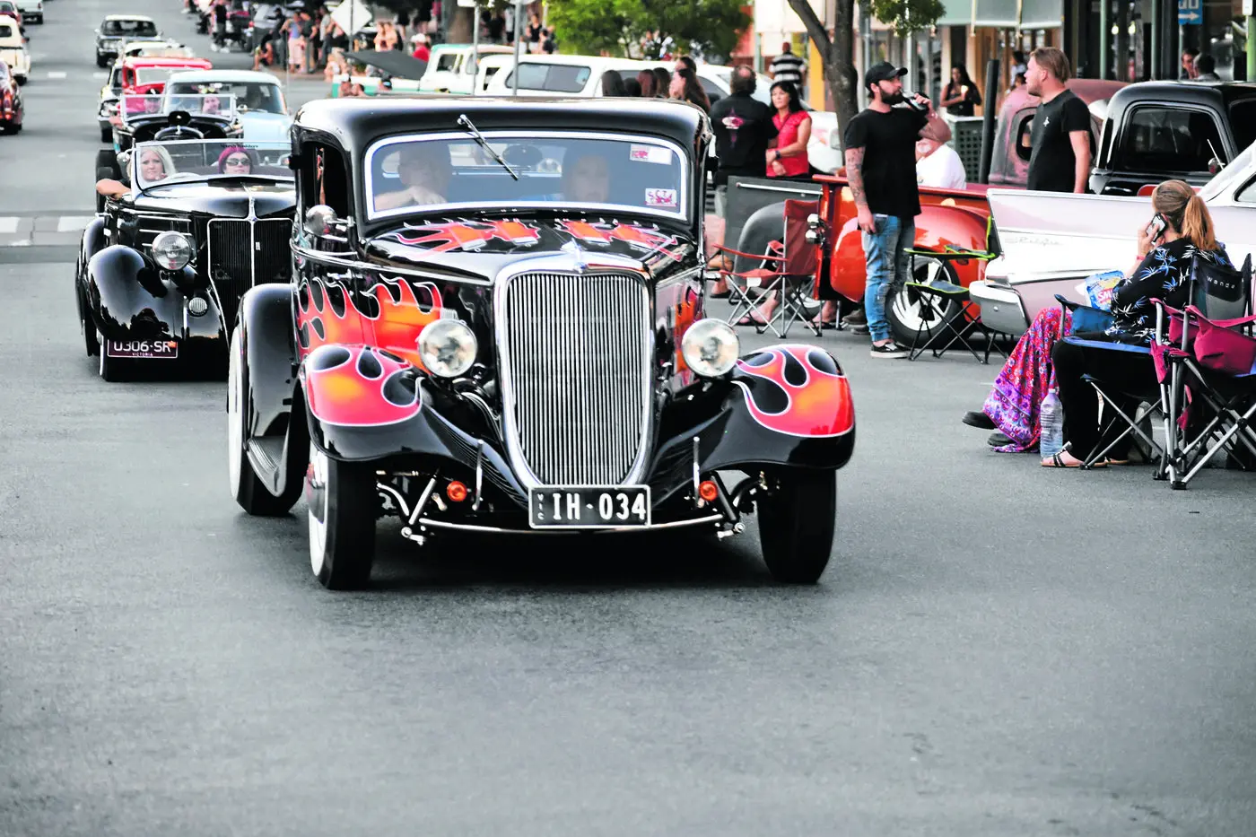 Ian Hardy, Kilsyth, Vic, at the wheel of his 1934 Ford coupe while cruising East Street during the Easter Rod Run. Photo: Rustty Lake-Connolly