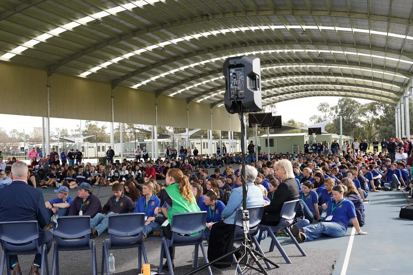 Part of the crowd discussing the proposal at Yanco Agricultural High School.