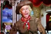 Doris Day playing Calamity Jane in her buckskins.
