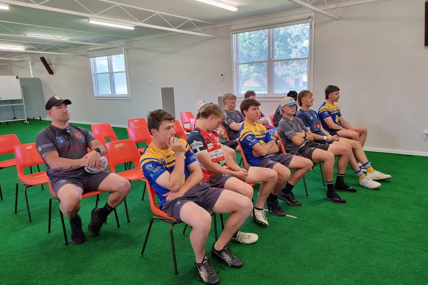 Riverina under 18s assistant coach Damian Willis is pictured here with a group of players during one of the Bulls sessions.
