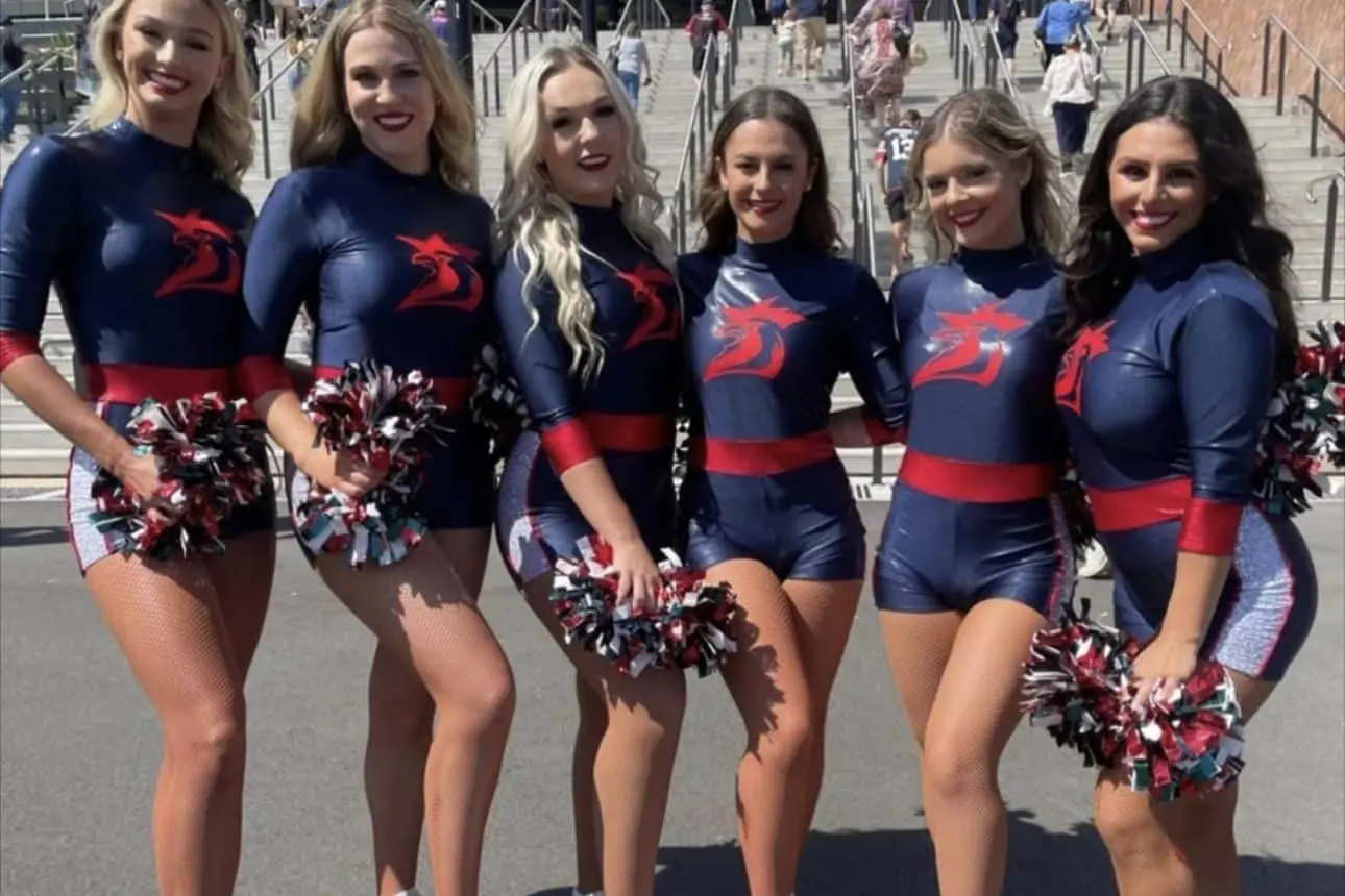 Lara Salvestro (second from right) is part of the NRL Sydney Roosters cheerleading squad.