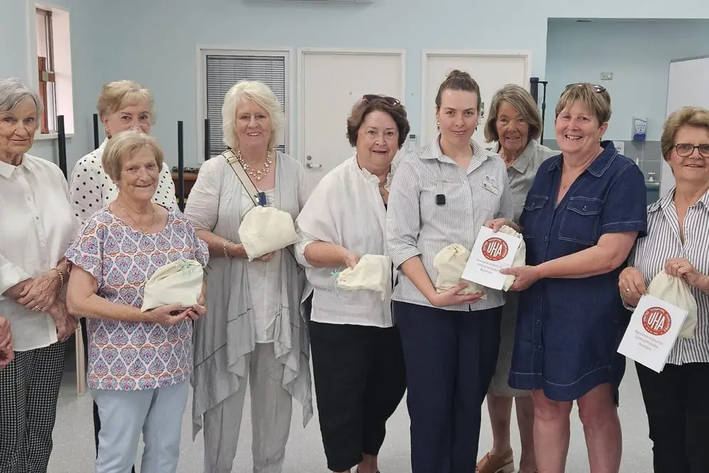 Nurse Unit Manager of the General Ward at Narrandera Hospital Jasmine Morrison (fifth from right) was presented with gift bags containing toiletries for patients by members of the Narrandera Hospital Auxiliary.