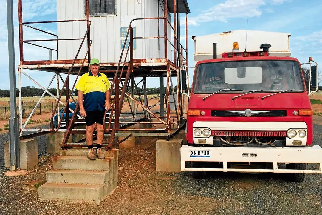 Ian Sherwood is the first grower to deliver wheat to the reopened Ariah Park bulkhead. Photo: Supplied