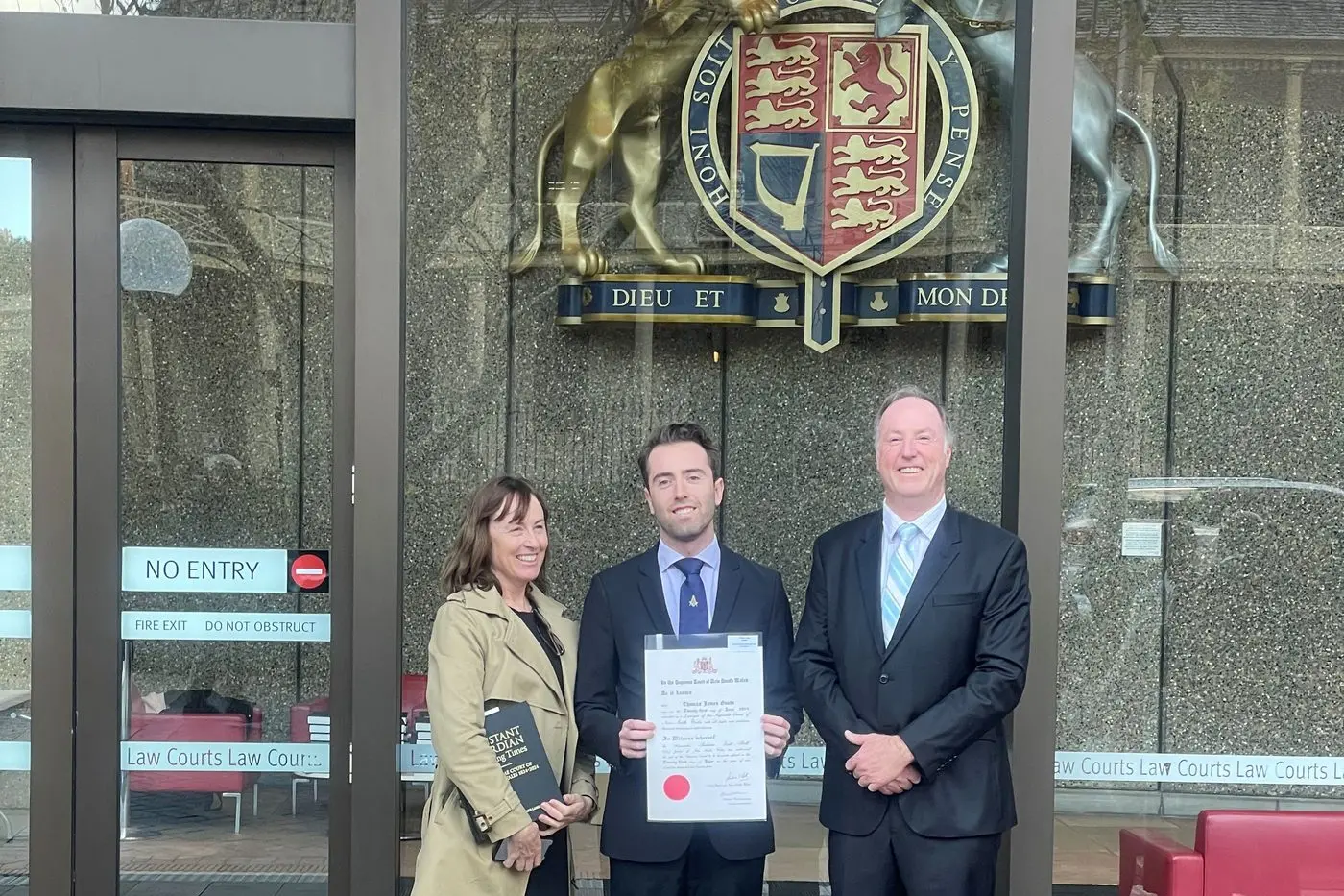 Law graduate Tom Goode with his proud parents Jason and Lisa Goode outside the Supreme Court in Sydney following Tom\\u2019s graduation.
