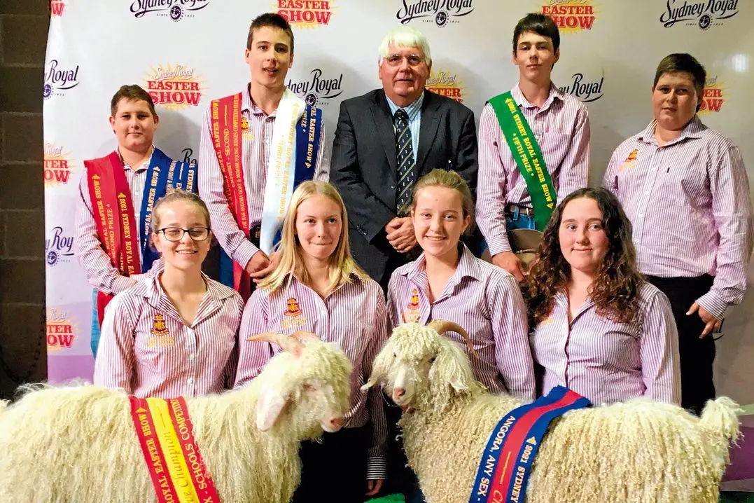 NHS students with their prize-winning goats (back from left) Horatio Davies-Botton, David Beard, Daryl Finch (judge), Jordan Tunks,Talon Davies-Botten (front) Eliza Fraser, Mikalie Vearing, Madeline Fraser and Ruby Hewitt. Photo: Supplied