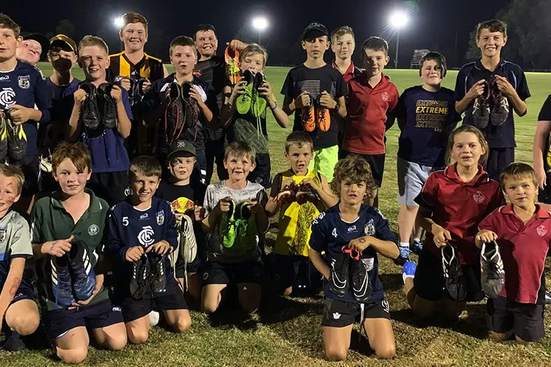 Footy boots of all sizes have been donated by the community. Photo: Supplied