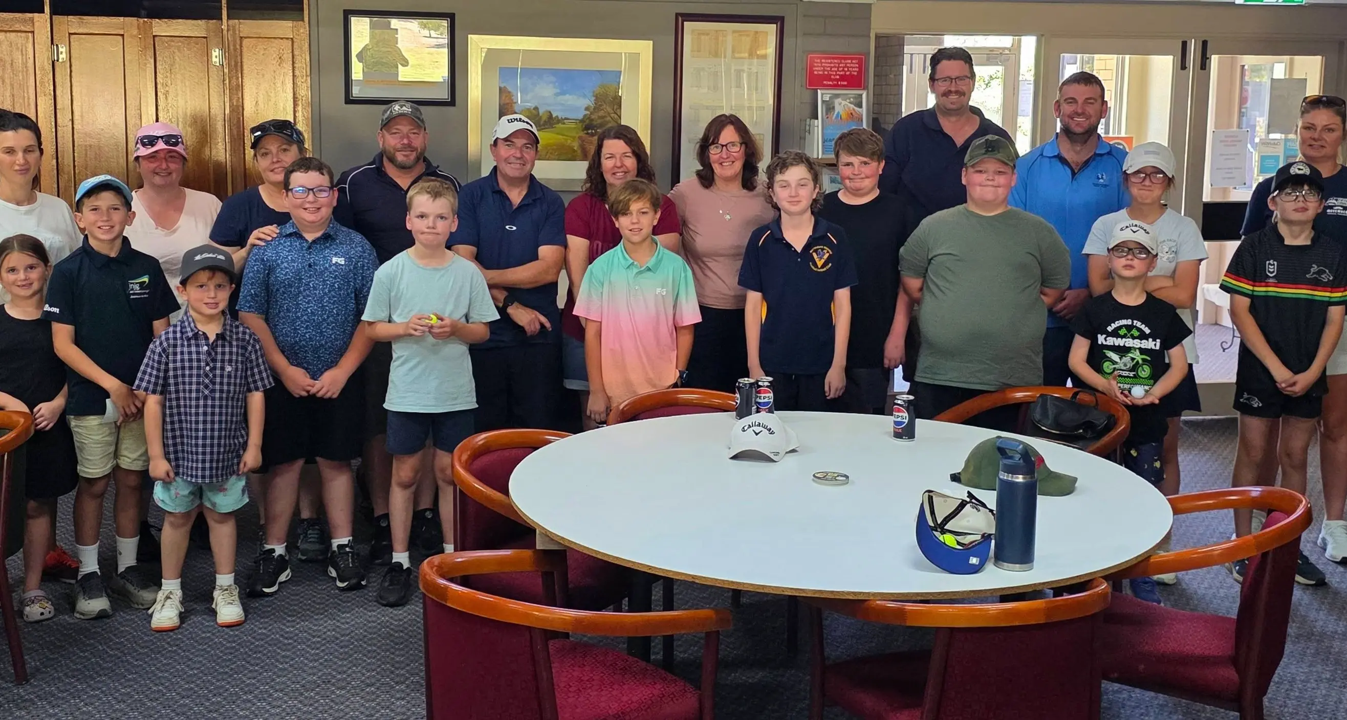 Junior golfers swinging well