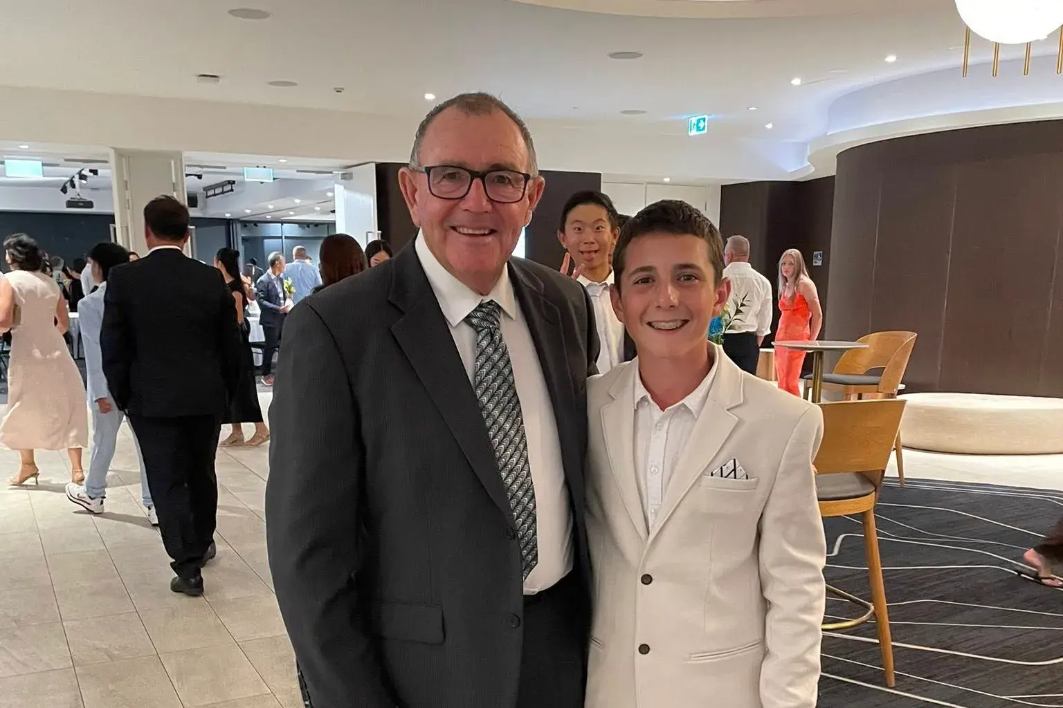 Young golfer teams up with grandfather