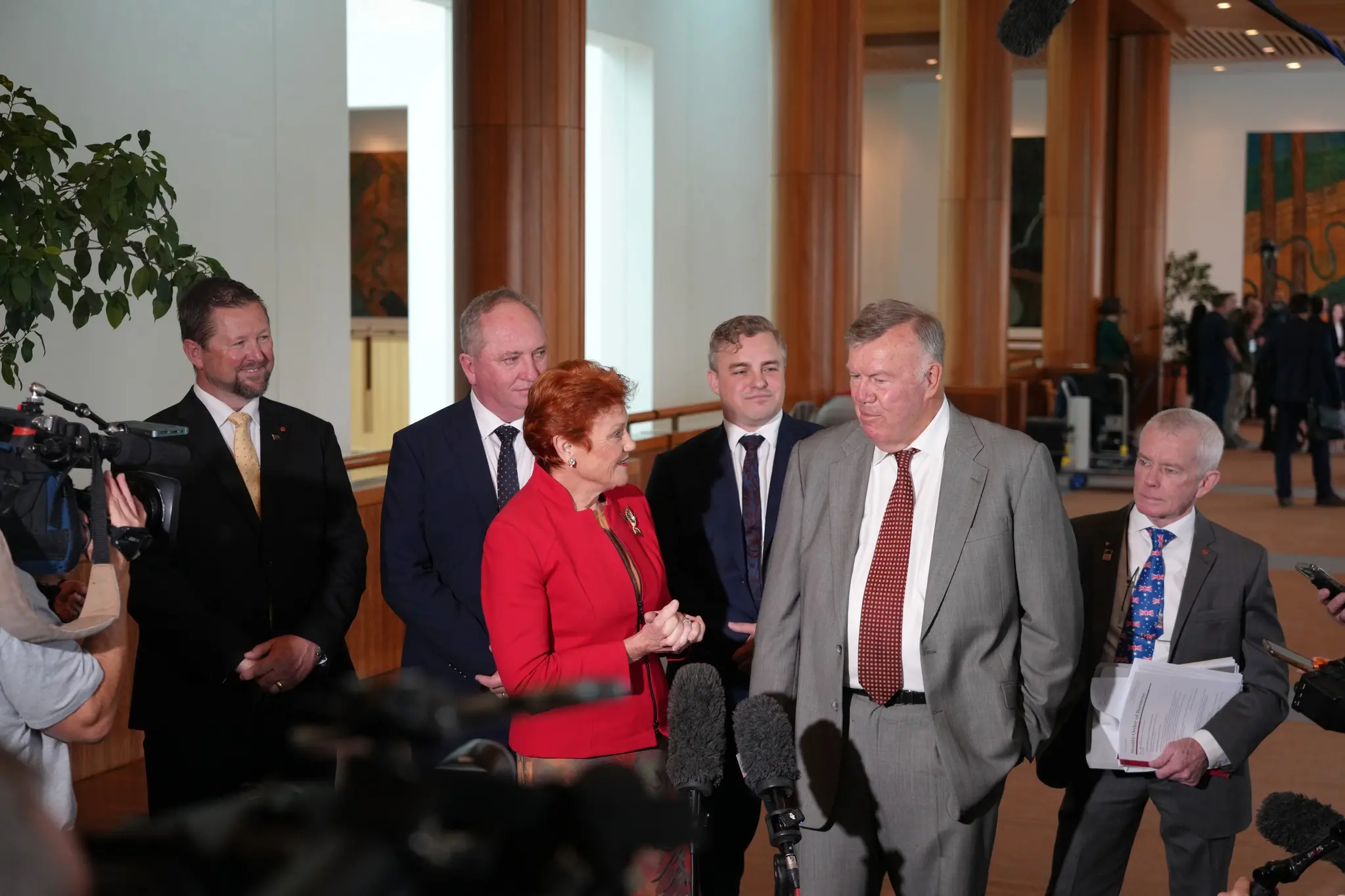 <p>David Farley with members of the One Nation team</p>\\n