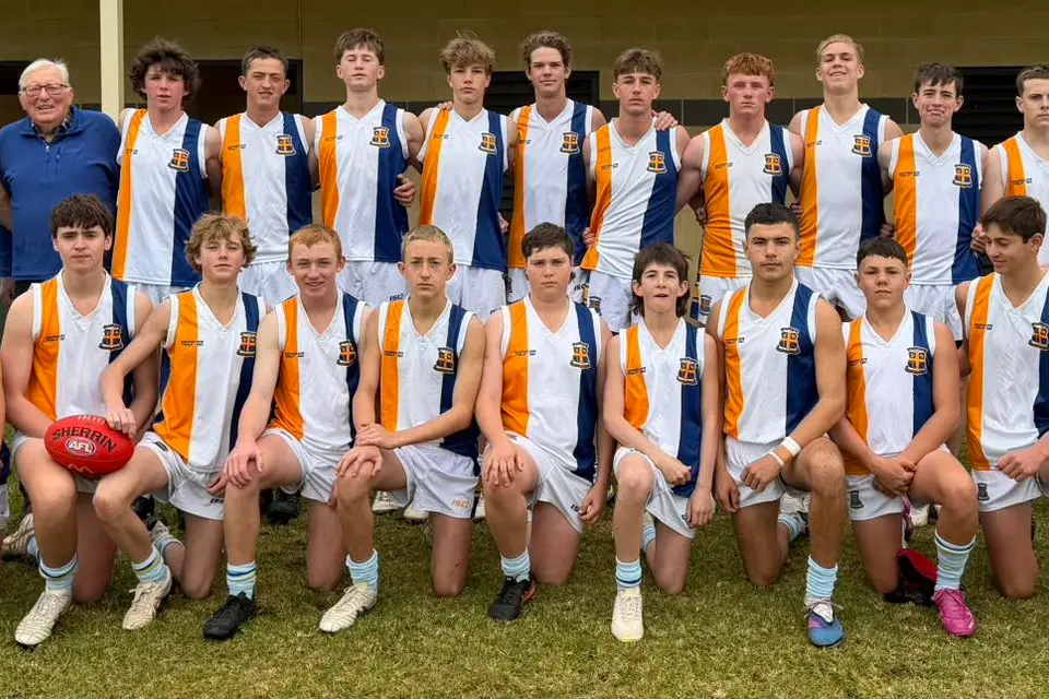 <p>The YAHS successful team with former Principal, Brian Roberts, who is always a loyal supporter when YAHS is playing games in Wagga.</p>\\n