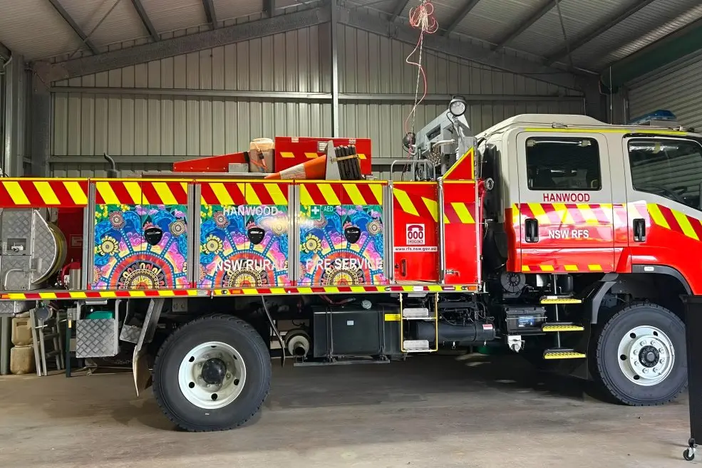 <p>NSW RFS unveiled Aboriginal artwork on the Hanwood Rural Fire Brigade\\'s truck. Photo: Supplied</p>\\n