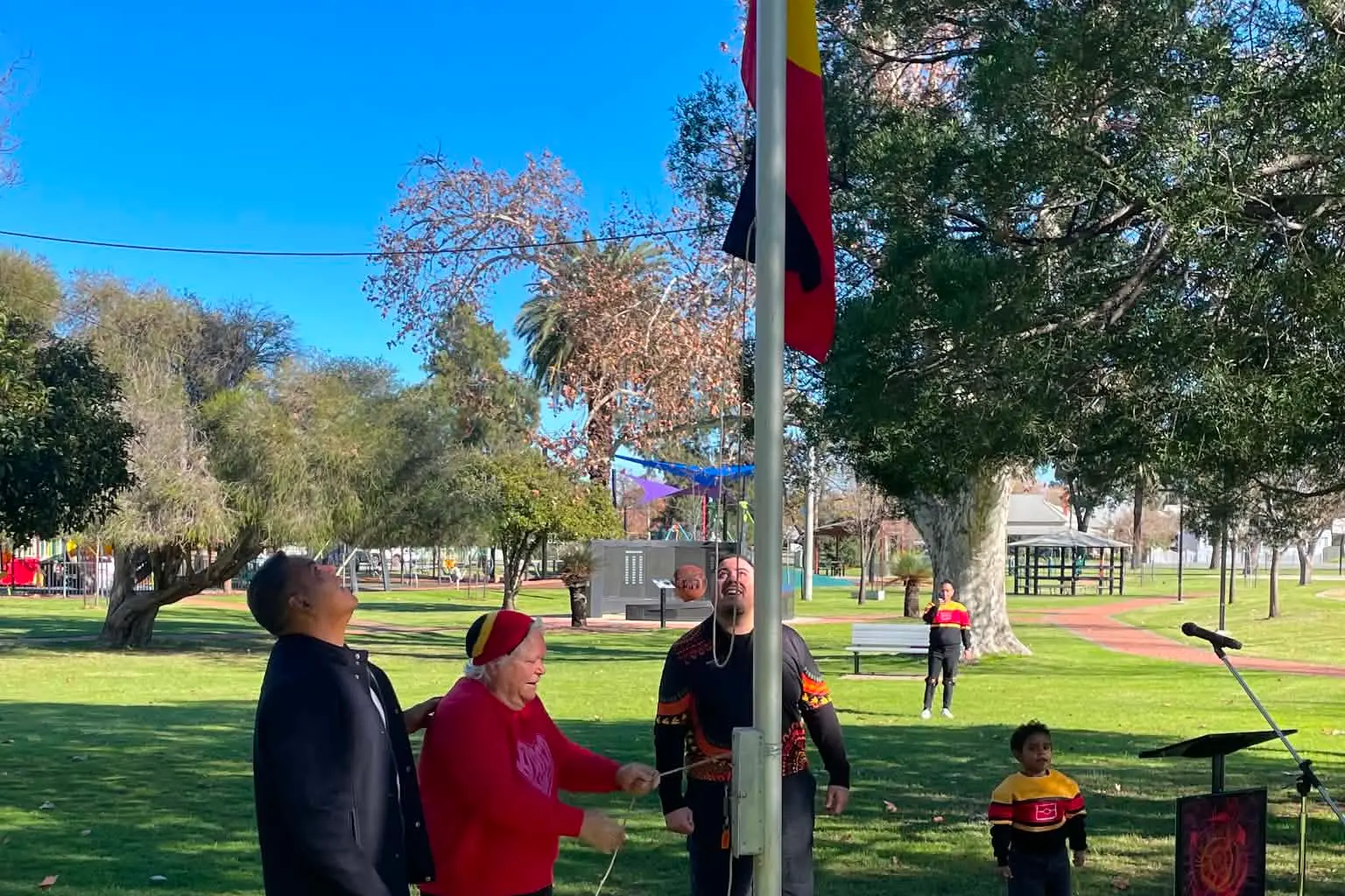 <p>Aunty Jennifer Johnson, Geoffrey Johnson and Cr Braden Lyons at the flag-raising ceremony.</p>\\n